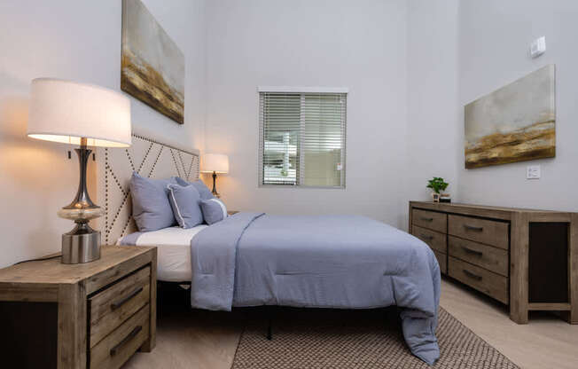 Bedroom with window and painting