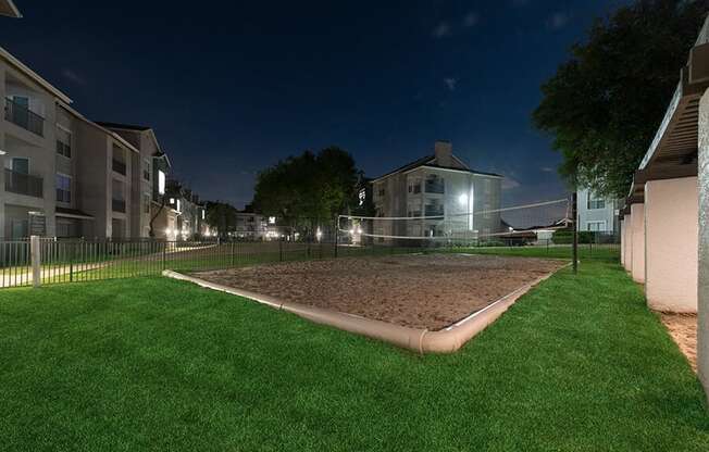 Outdoor Sand Volleyball Court at Essence North Dallas Apartments located in Dallas, TX.