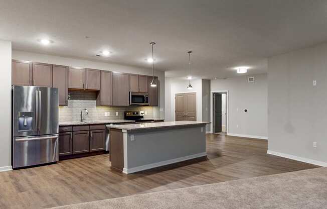 Large kitchen floor plan with island at WH Flats