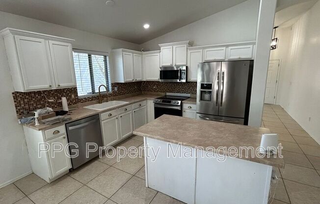 7108 W FAWN DR