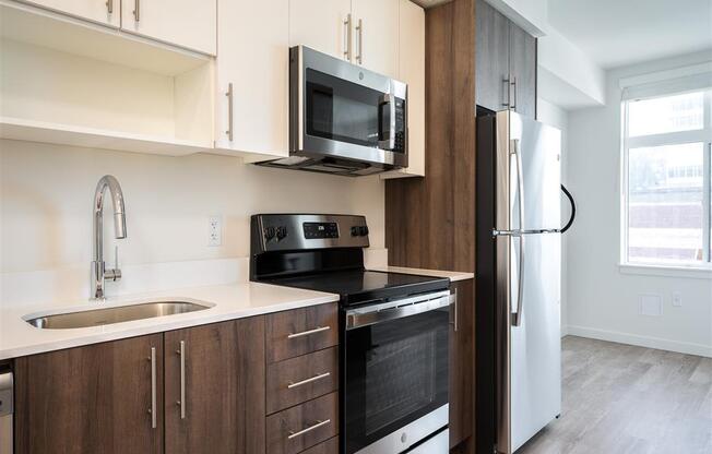 a kitchen with a sink and a door