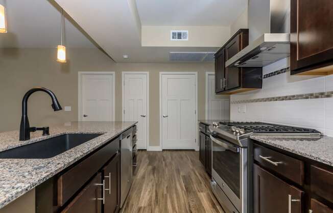Kitchen appliances and cabinets at Level 25 at Sunset by Picerne, Nevada, 89113