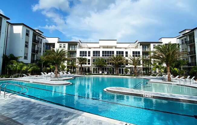 Heated saltwater pool with swim lane, cabanas, sun shelves and WiFi