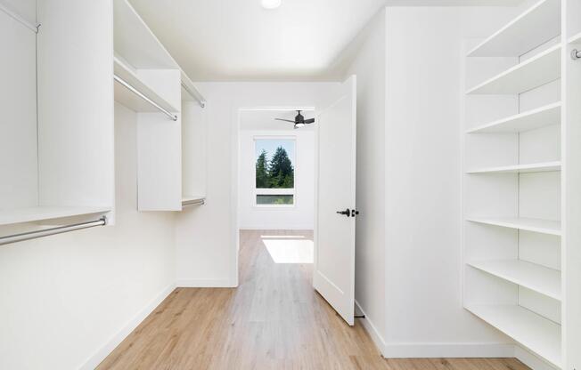 Spacious closet with built-in shelving and hanging space modera bridle trails apartments for rent in kirkland wa
