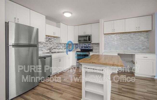 26 10th Street W