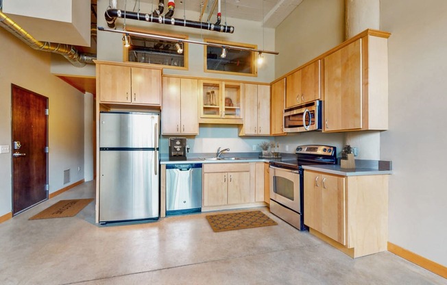 -Virtually Staged Kitchen at Buzza Lofts of Uptown, Minneapolis