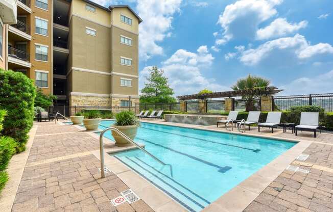 our apartments have a resort style pool with lounge chairs