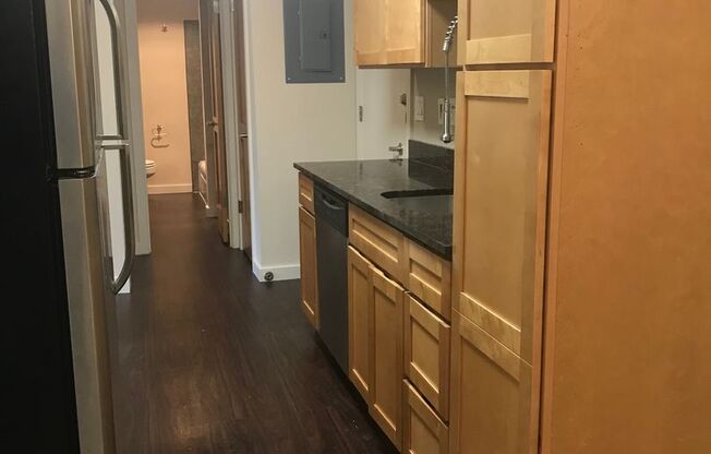 Currently available: Conveniently located large 1 bedroom with a modern kitchen,