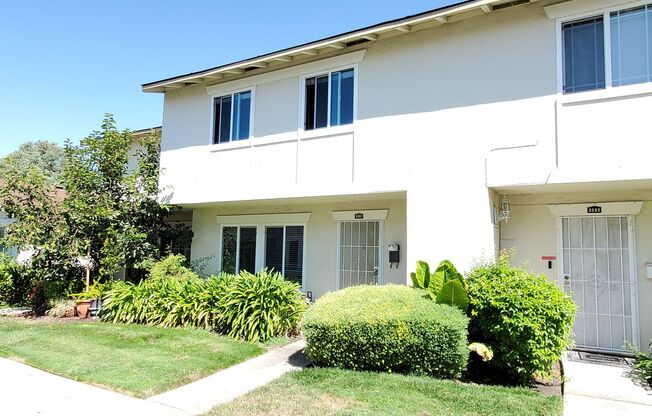 Spacious 2-Story Townhome, Fresh Paint, New Carpet, Wood Floor Downstairs, Patio, Dual Pane, Washer/Dryer Hookups!