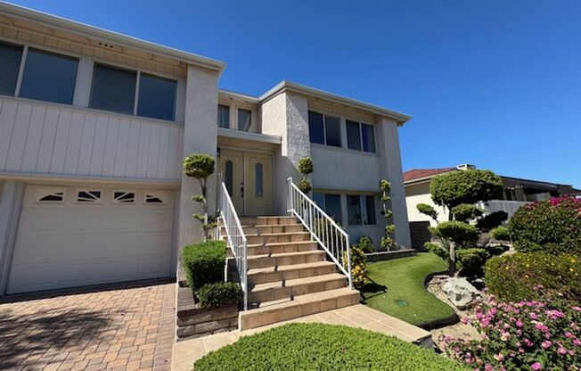 Newly Renovated 4 Bedroom 3 Bath Home with 2 Car Garage, Washer/Dryer hook-ups and Ocean/Harbor views