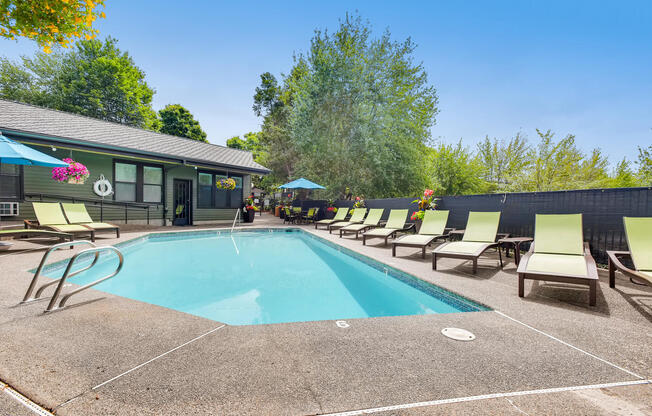 Apartments for Rent in Lake Oswego, OR - Westlake Meadows Swimming Pool with Lounge Chairs and Covered Table Seating