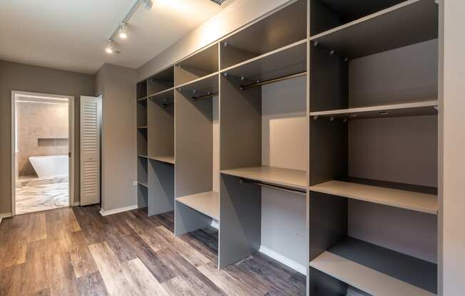 a walk in closet in a new home