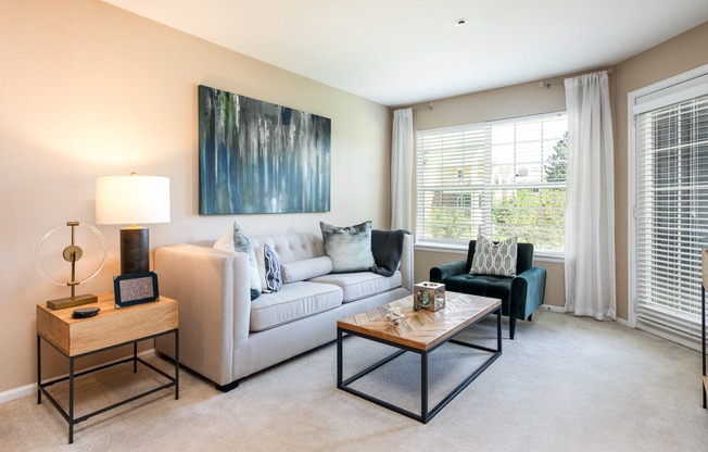 a living room with a couch and a coffee table