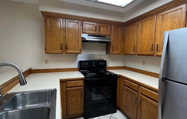 Long Realty & Property Management - Large Aurora Townhome with Finished Basement