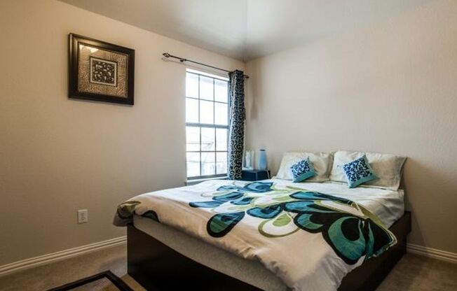 Bright and airy living room, fireplace, study, custom lighting in the formal living and dining.