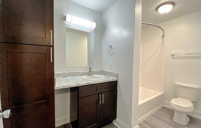 Spacious modern bathroom with storage at Camelot East Apartments, Fairfield, OH, 45014