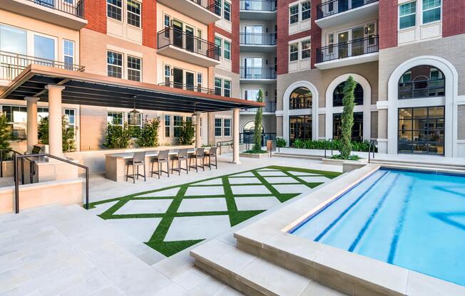 Escape to paradise at Modera Waugh! Enjoy sunny days by our resort-style pool with a spacious sundeck, ideal for lounging and soaking up the Houston sun.