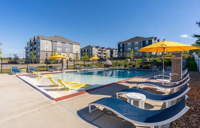 Large Pool Sundeck with lots of Lounge Chair Options