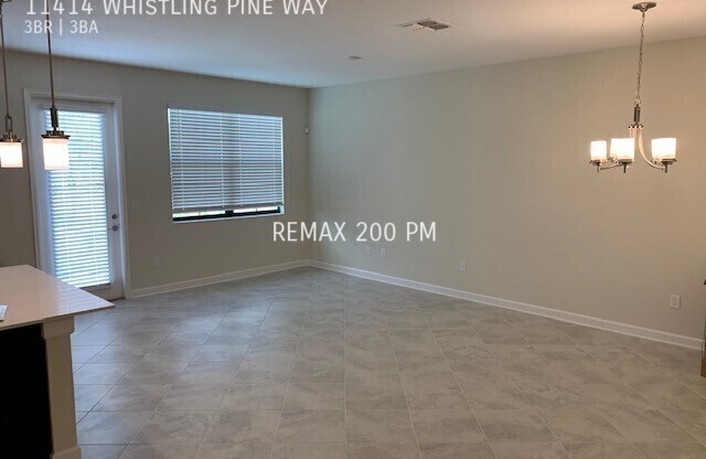 11414 WHISTLING PINE WAY