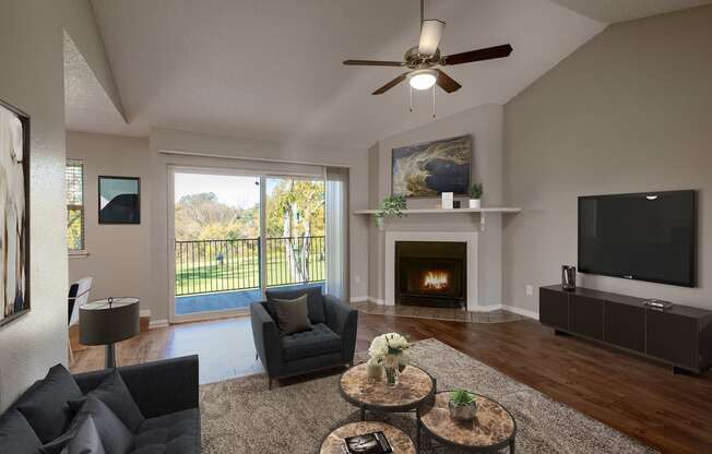 Living Room with Balcony at The Villas at Quail Creek Apartment Homes in Austin Texas