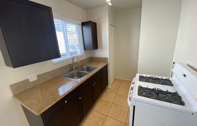 Lower Level 1 Bed + 1 Bath with Laundry On-site