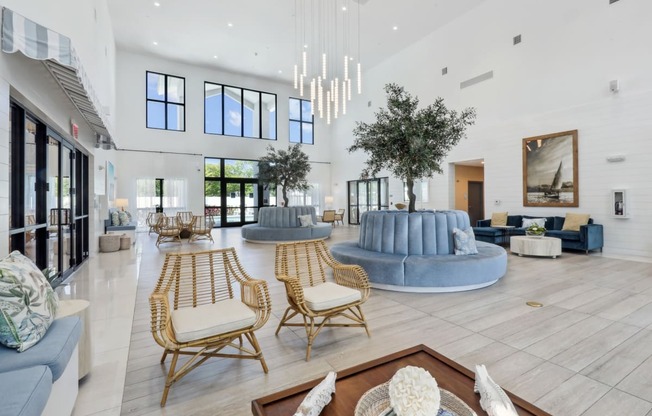 Clubhouse with beautiful trees and seating at Westgate on University in Lauderhill, FL