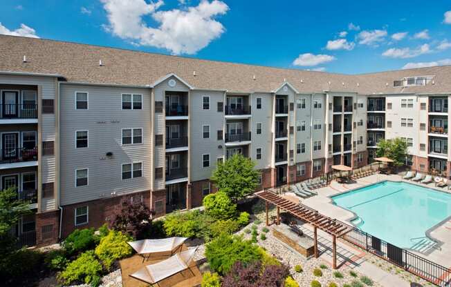 View of apartment complex and outdoor pool at Alexander at Patroon Creek, Albany
