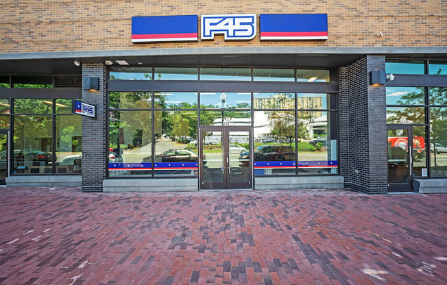 A F45 sign is on a brick building.