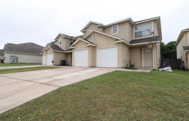 Converse 3 Bedroom Townhouse with Attached One-Car Garage and Large Fenced Backyard