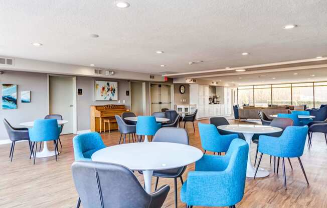 a large room with tables and chairs