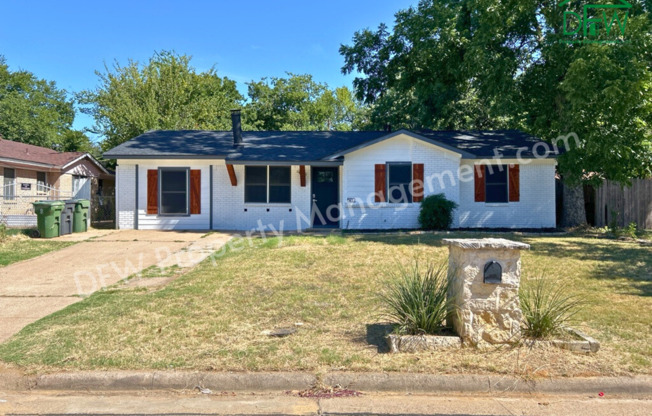 Spacious 4-Bedroom Home with Large Backyard and Custom Stone Fireplace