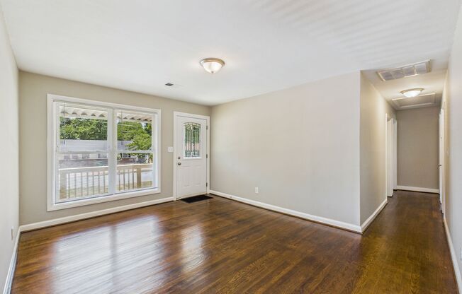 Updated home with New Kitchen, Hardwood Floors, Fenced!