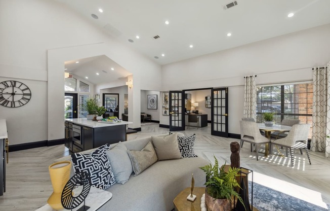 a living room with a couch and a table