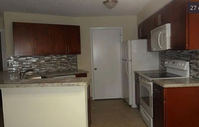 Upgraded 2BR/2BA with Balcony – Prime Location! Quiet Gated Complex (Available for Move-In 9/1)