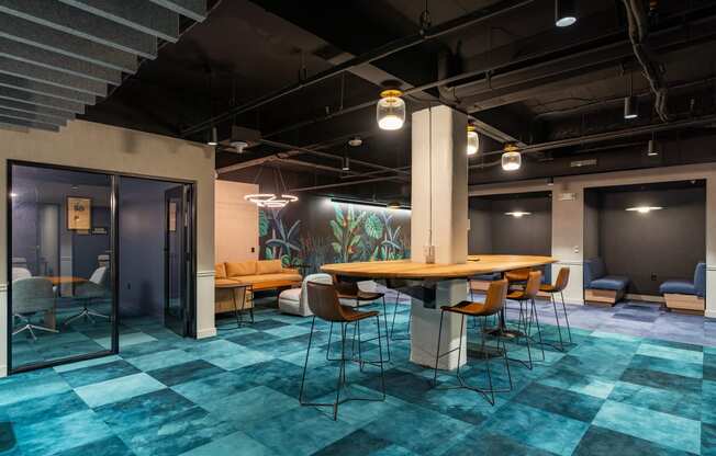a large meeting room with a table and chairs
