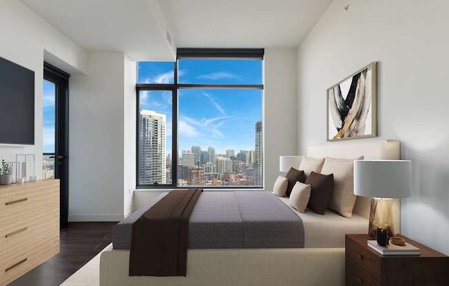 a bedroom with a bed and a window at Cassidy on Canal, Chicago, Illinois, 60606