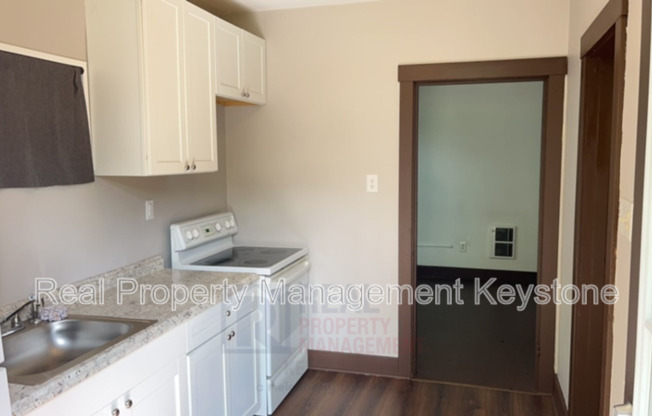 122 E 16 AVE