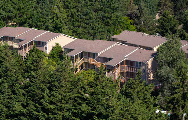 A large building surrounded by trees.