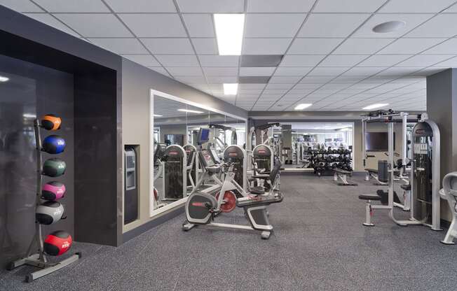 a fitness center with exercise equipment in a building