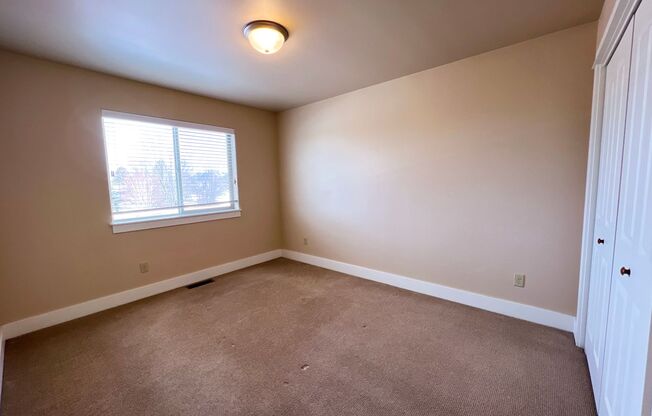 3-Bedroom Townhome with Double Garage & Private Fenced Yard