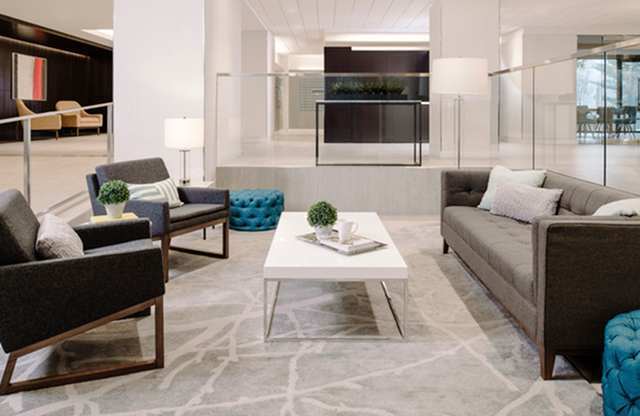 Living room with couch at The Graham at Southern Towers, Virginia, 22311