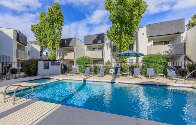 a house with a large pool of water