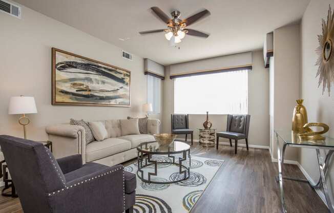 Living room with frame and lamps at The Fairways by Picerne, Las Vegas, Nevada