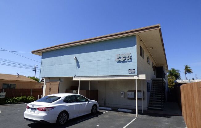 225 E 1st St.