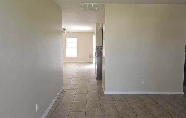 3/2/2 Single Family Home with Fenced in Yard!