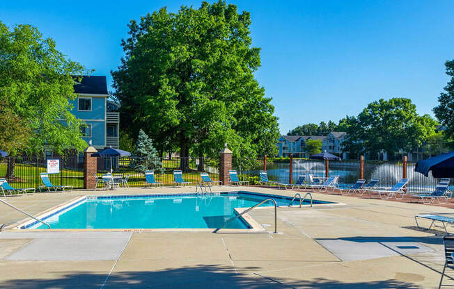 Relaxing Swimming Pool With Sundeck at North Pointe Apartments, Elkhart, IN