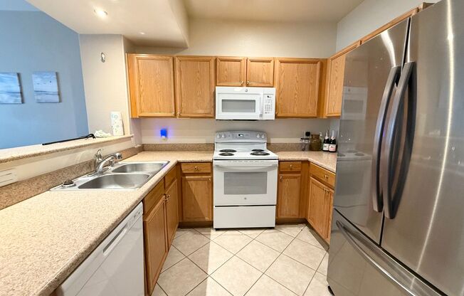 1/BD 1/BA Light-Filled Condo in Gated Community