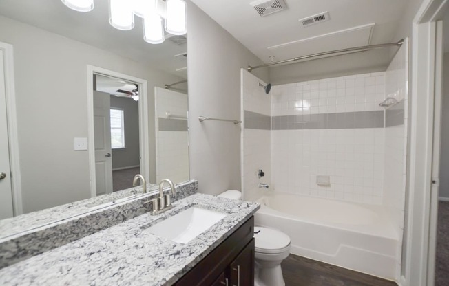 Beautiful upgraded bathroom with granite countertops, oversized garden tub, located at The Legends at Eagle Mountain Lake -A beautiful lakeside community.