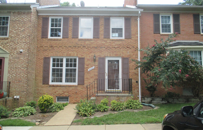 SPACIOUS BRICK TOWN-HOME