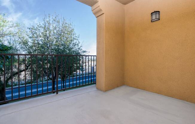 a balcony with of trees